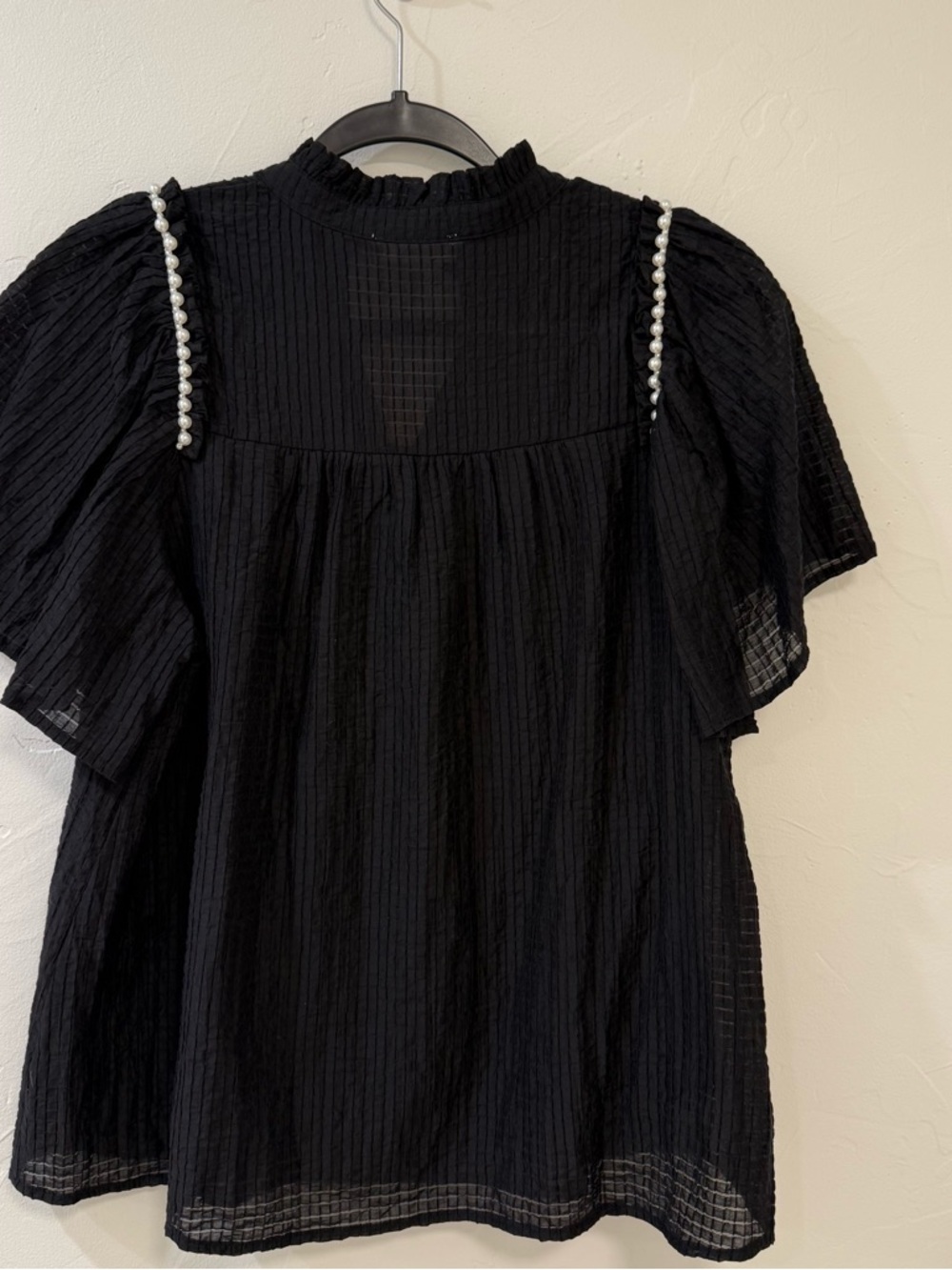 Feminine flowy top from Entro.  Black Ruffle Sleeve Blouse with Pearl Trim - Picture 2 of 14